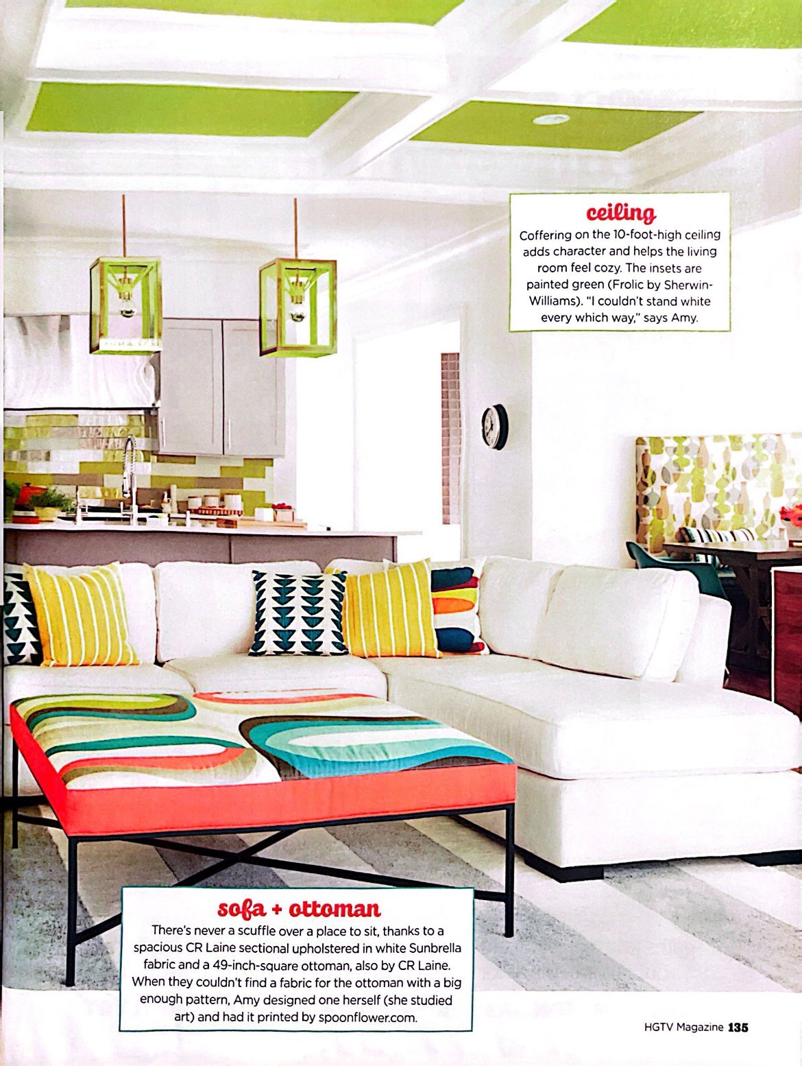 HGTV Magazine page showing a white sectional, a boldly patterned ottoman and green lantern pendants beneath a coffered ceiling