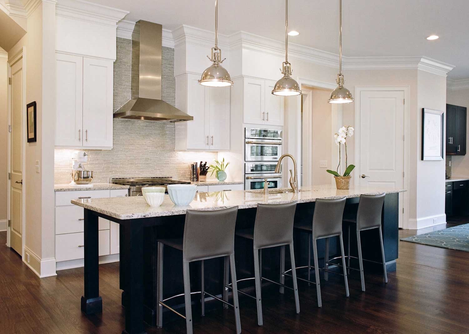 White kitchen with navy island