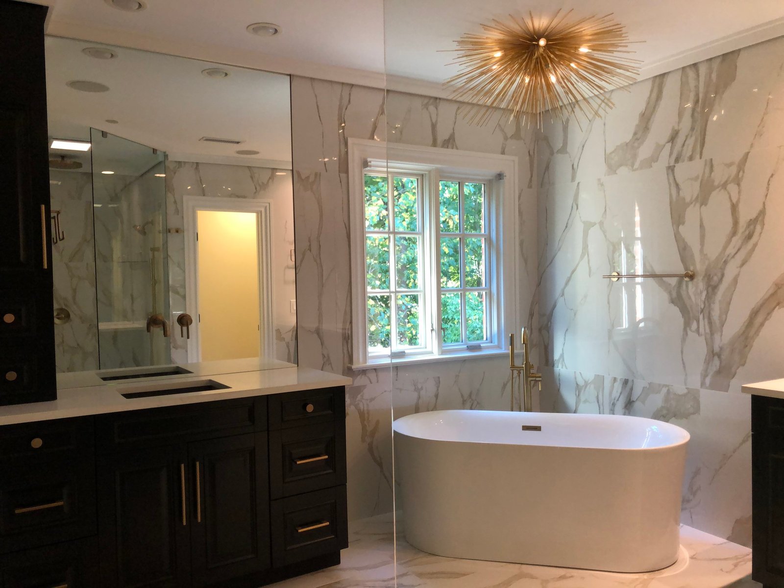 Marble bathroom with freestanding tub